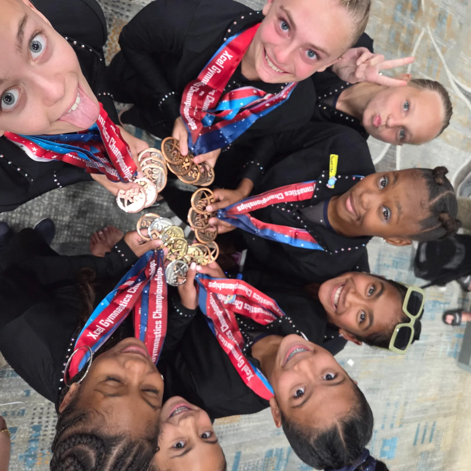 Precision team gymnasts at a meet